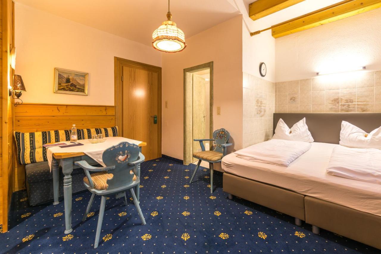 גרמיש-פרטנקירכן Hotel Garni Almenrausch Und Edelweiss מראה חיצוני תמונה